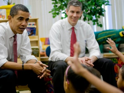 President-elect Barack Obama and Chicago Public Schools CEO Arne Duncan, right, talk with students at the Dodge Renaissance Academy Tuesday, December 16, 2008, in Chicago, Illinois. The two met with the students after Obama introduced Duncan as his choice for education secretary.