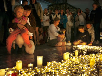 Friends and loved ones gather at the Oslo cathedral to mourn 93 victims killed in twin terror attacks from a bombing in downtown Oslo and a mass shooting on Utoya island on July 24 ,2011, in Oslo, Norway.