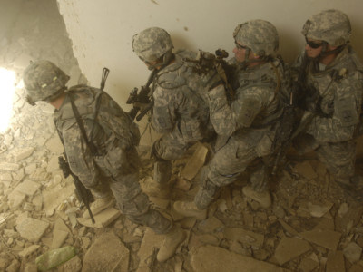 U.S. Soldiers from Echo Company, 5th Cavalry Regiment, 172nd Infantry Brigade prepare to clear a room in a joint training exercise near Bahbahani, Iraq, on June 4.