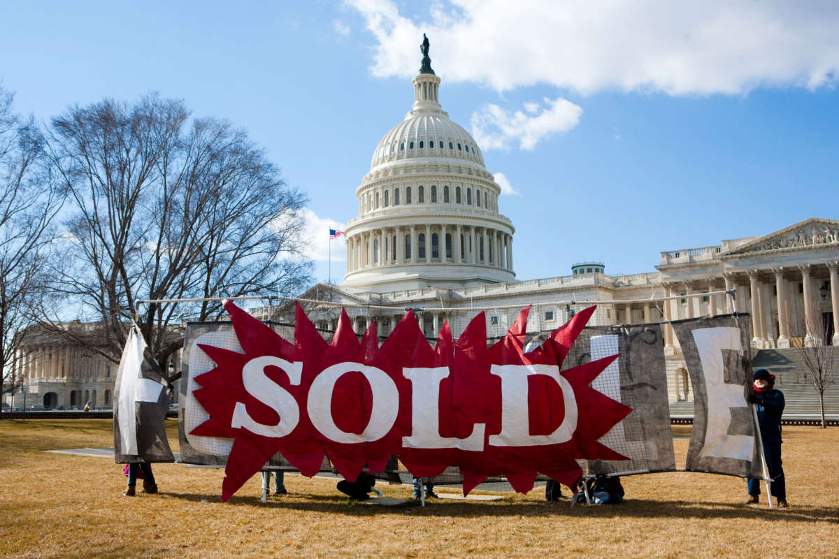 Activists rally for a constitutional amendment overturning the Citizens United Supreme Court decision on Friday, January 21, 2011.