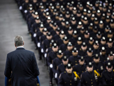 New York City Mayor Bill de Blasio speaks at the New York Police Department graduation ceremony at Madison Square Garden on December 29, 2014 in New York City. The Mayor's relationship with the city's police force has been strained after the deaths of two police officers.