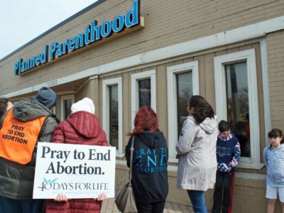 Anti-choice demonstrators gather around Planned Parenthood, March 24, 2017, in Ferndale, Michigan.