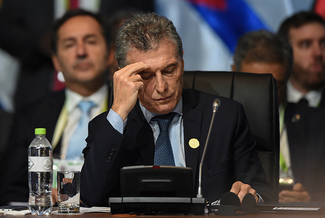 Argentinian President Mauricio Macri attends the plenary session of the Eighth Americas Summit in Lima, on April 14, 2018.