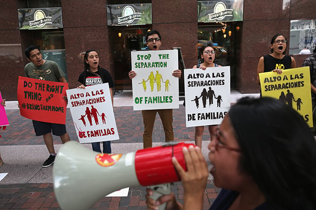Demonstrators protest the deportation of undocumented immigrants on July 24, 2013, in New York City.