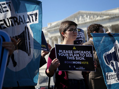 Proponents of an open and unregulated internet attend a news conference at the US Capitol February 27, 2018, in Washington, DC.