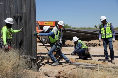 Workers replace an old section of the wall between the US and Mexico following orders by President Donald Trump, in Santa Teresa, New Mexico, close to Ciudad Juarez in Mexico's Chihuahua State, on April 23, 2018.