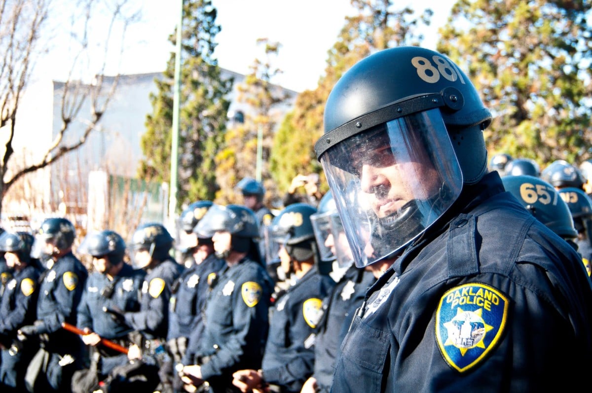 Riot police stare down protesters during Occupy Oakland on January 28, 2012, in Oakland, California.