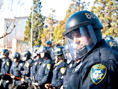 Riot police stare down protesters during Occupy Oakland on January 28, 2012, in Oakland, California.