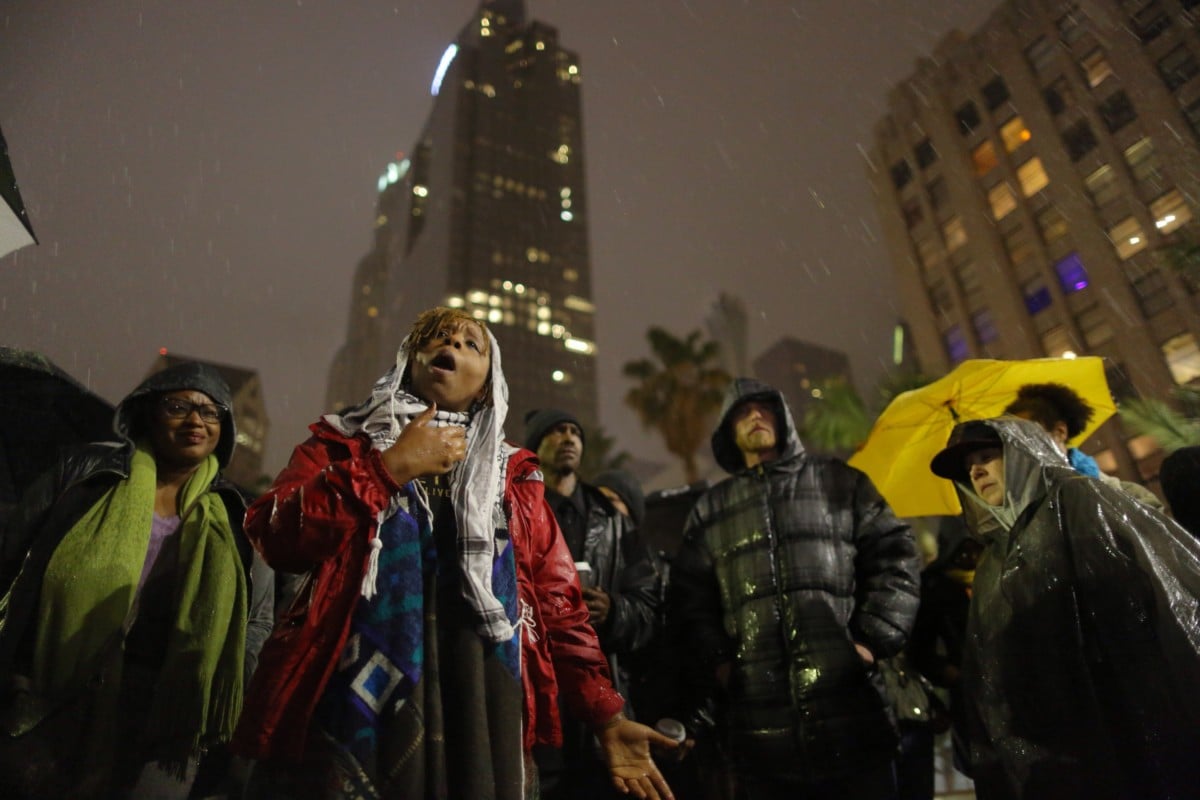 Black Lives Matter co-founder Patrisse Khan-Cullors speaks to people gathered at Pershing Square in Los Angeles, California. People gathered to protest the death of a homeless man killed by police March 1, 2015.