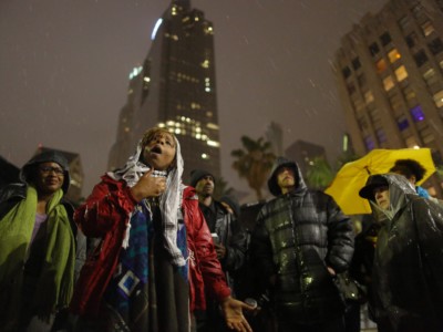 Black Lives Matter co-founder Patrisse Khan-Cullors speaks to people gathered at Pershing Square in Los Angeles, California. People gathered to protest the death of a homeless man killed by police March 1, 2015.