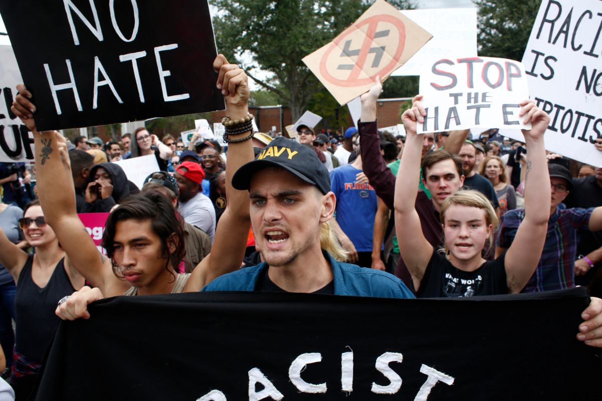 Demonstrators gather at the site of a planned speech by white nationalist Richard Spencer at the University of Florida campus on October 19, 2017, in Gainesville, Florida.