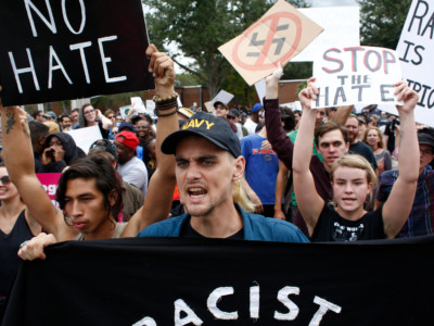 Demonstrators gather at the site of a planned speech by white nationalist Richard Spencer at the University of Florida campus on October 19, 2017, in Gainesville, Florida.