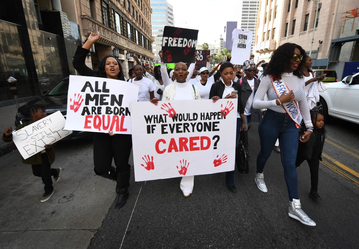 Marchers protest during the March Against Slavery to raise international awareness of migrants being abused and exploited, held in Los Angeles, California on January 27, 2018.