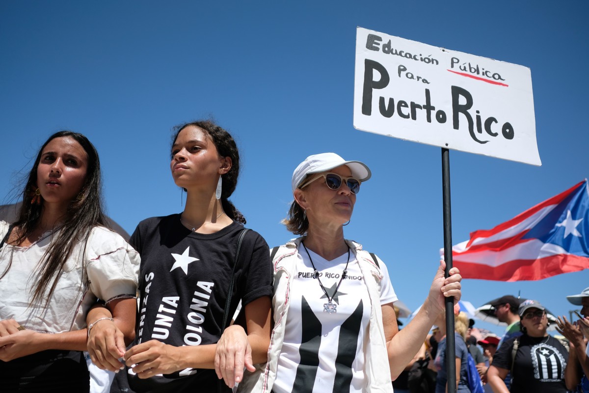 Teachers participate in a one-day strike against the government's privatization drive in public education, in San Juan, Puerto Rico, on March 19, 2018.