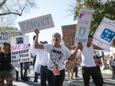 Black Lives Matter protesters march through the streets in response to the police shooting of Stephon Clark in Sacramento, California on March 28, 2018.