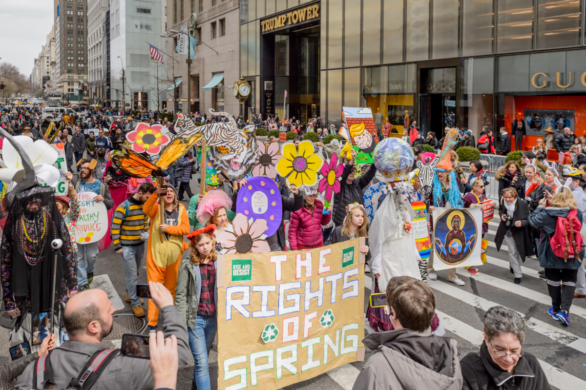 Members and sympathizers of "Rise And Resist" participated in the Easter Parade walk on Fifth Avenue; with Fussy Lo Mein as Mother Nature handing out Easter eggs decorated with "The Rights of Spring." The group marched as close as possible to Trump Tower to bring their message to protect the environment.