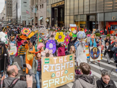 Members and sympathizers of "Rise And Resist" participated in the Easter Parade walk on Fifth Avenue; with Fussy Lo Mein as Mother Nature handing out Easter eggs decorated with "The Rights of Spring." The group marched as close as possible to Trump Tower to bring their message to protect the environment.