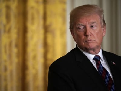 Donald Trump listens during a joint news conference in the East Room of the White House April 3, 2018, in Washington, DC.