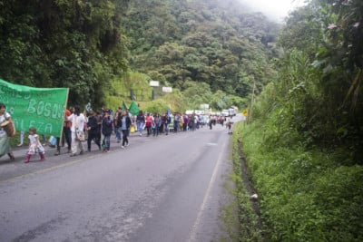 Protesters march to demand an end to mining in Ecuador on March 22, 2018, near Mindo, Ecuador.