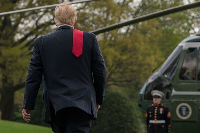 Donald Trump walks towards Marine One on the South Lawn of the White House on April 28, 2018, in Washington, DC.