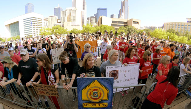 Students and adults rally at the Rally4Reform protest to push for gun reform at City Hall in Dallas on Saturday, May 5, 2018.