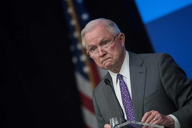 US Attorney General Jeff Sessions looks on as he addresses the National Sheriffs' Association opioid roundtable in Washington, DC, on May 3, 2018.