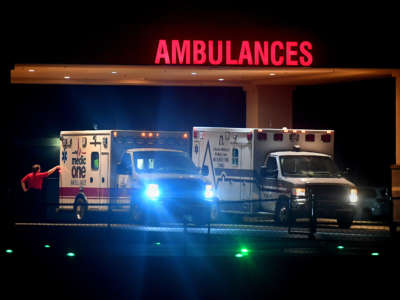 A pair of ambulances that serve both southeast Missouri and northeast Arkansas are parked in the ambulance bay at the Poplar Bluff Regional Medical Center in Poplar Bluff, Missouri, on July 19, 2019.