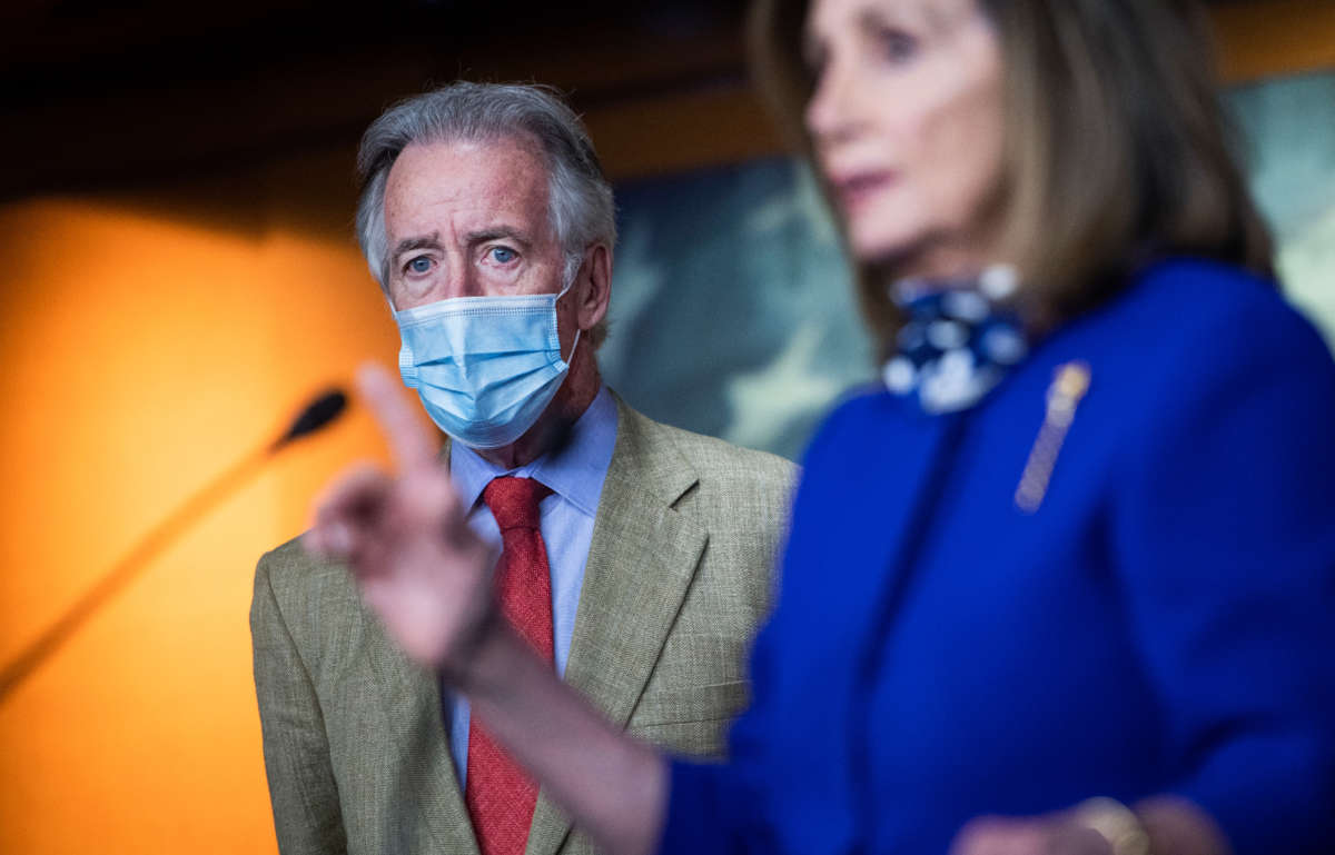 Rep. Richard Neal stands by as Speaker of the House Nancy Pelosi speaks at a news conference in the Capitol Visitor Center on July 24, 2020.