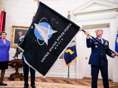 The official flag of the United States Space Force is presented in the Oval Office of the White House in Washington, D.C. on May 15, 2020.