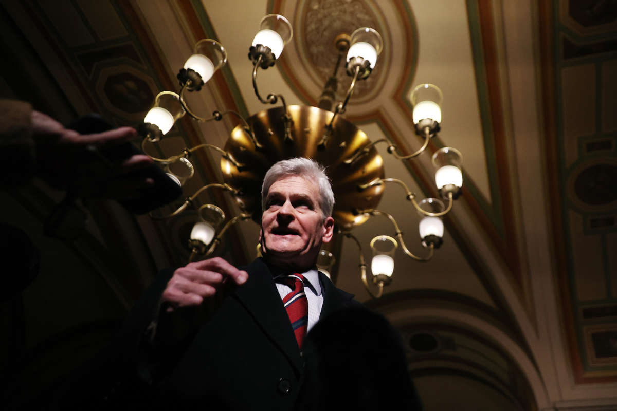 Senator Bill Cassidy talks with reporters as he leaves the Capitol after the first day of former President Donald Trump's second impeachment trial February 9, 2021, in Washington, D.C.