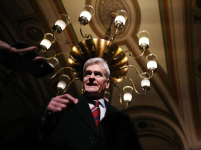 Senator Bill Cassidy talks with reporters as he leaves the Capitol after the first day of former President Donald Trump's second impeachment trial February 9, 2021, in Washington, D.C.