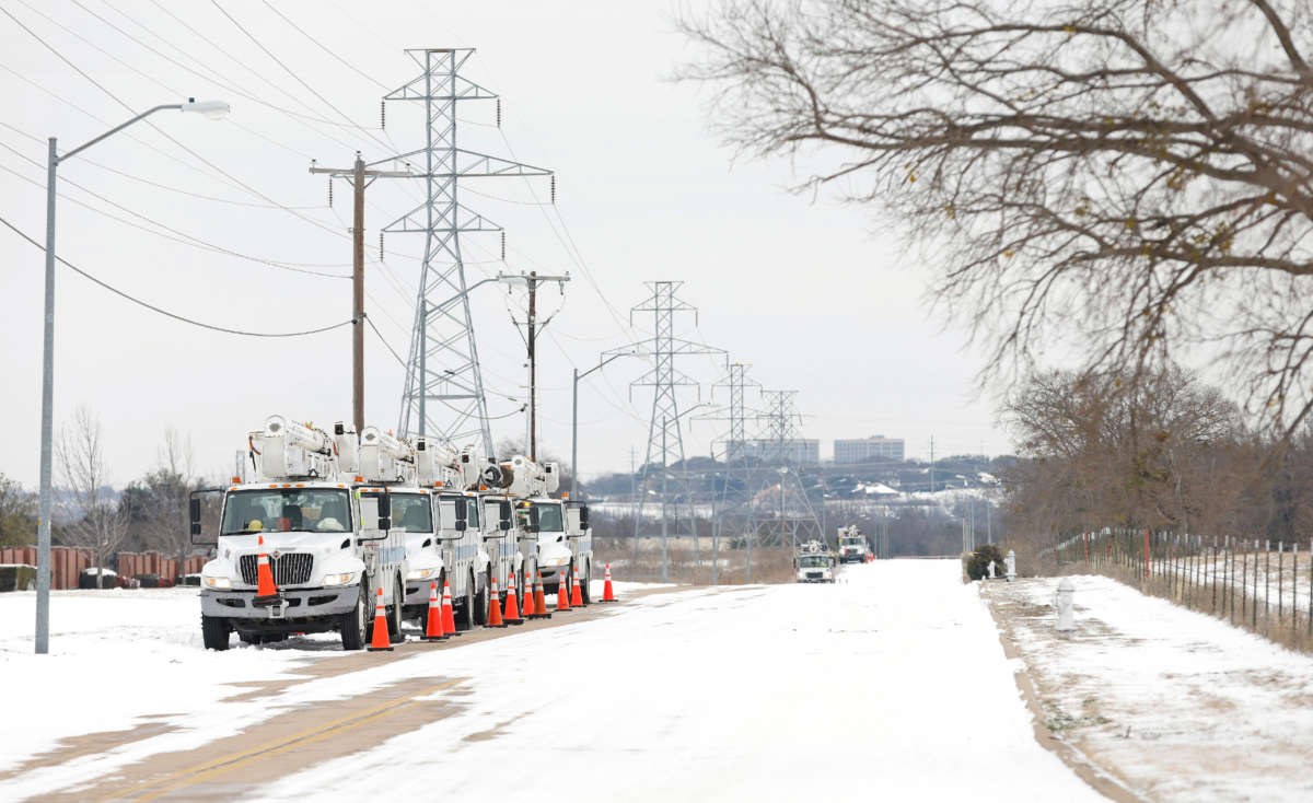 Pike Electric service trucks line up after a snow storm on February 16, 2021, in Fort Worth, Texas.