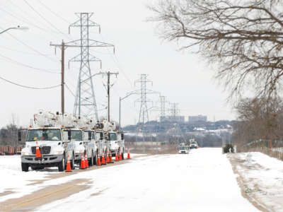Pike Electric service trucks line up after a snow storm on February 16, 2021, in Fort Worth, Texas.