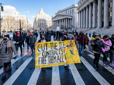 Protesters march through the streets of New York on February 6, 2021.