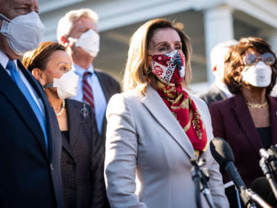 House Speaker Nancy Pelosi and other Democrat lawmakers speak outside the West Wing on February 5, 2021, in Washington, D.C.