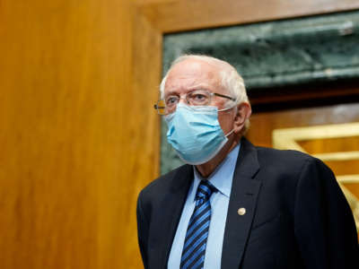 Senate Budget Committee Chairman Sen. Bernie Sanders arrives for a hearing on Capitol Hill examining wages at large profitable corporations on February 25, 2021, in Washington, D.C.