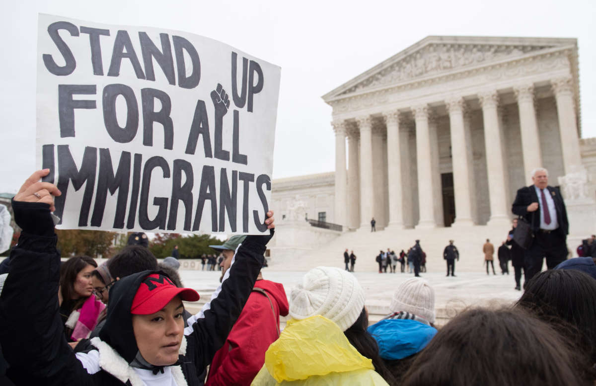 Immigration rights activists hold a rally in front of the Supreme Court in Washington, D.C., on November 12, 2019.