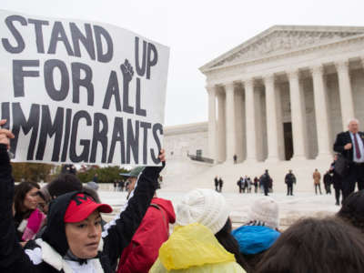 Immigration rights activists hold a rally in front of the Supreme Court in Washington, D.C., on November 12, 2019.