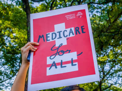 Protesters demonstrate outside of the New York County Republican Office in New York City on July 5, 2017.