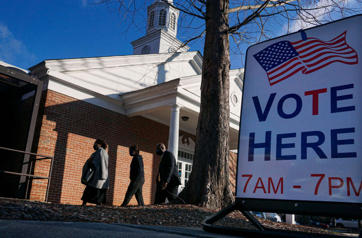 Voters enter a polling station at the Zion Baptist Church on January 5, 2021, in Marietta, Georgia.