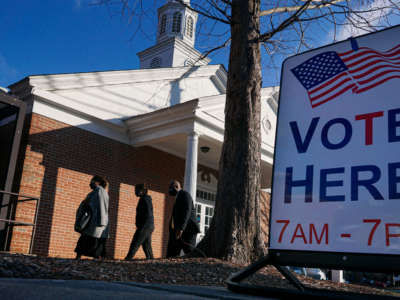 Voters enter a polling station at the Zion Baptist Church on January 5, 2021, in Marietta, Georgia.