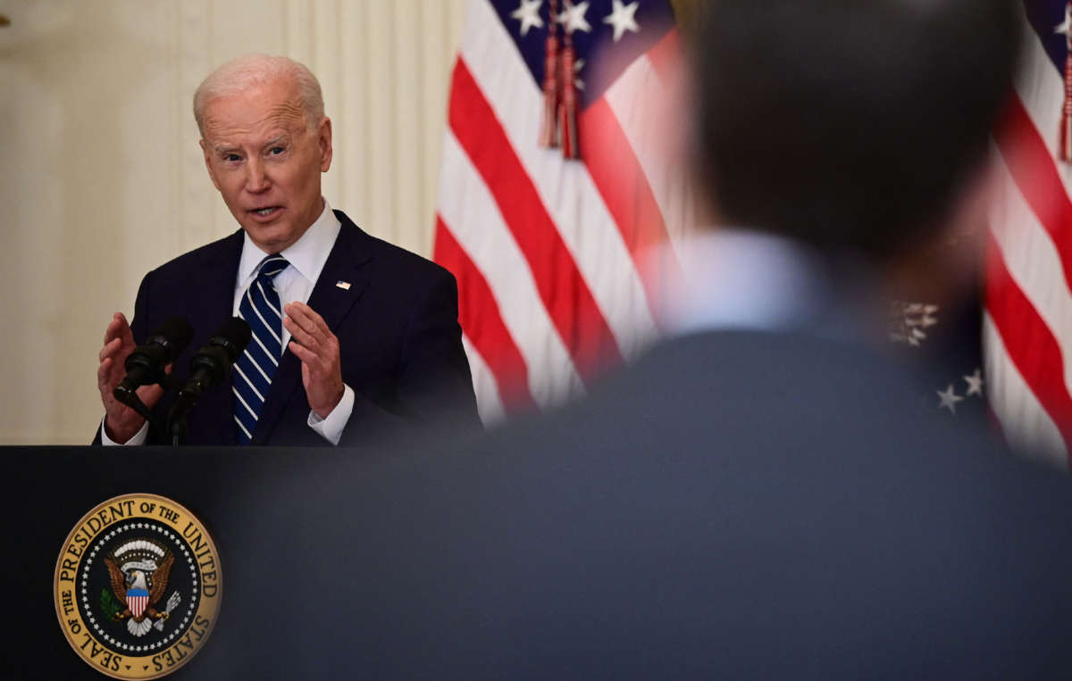 President Joe Biden answers a question during his first press briefing in the East Room of the White House in Washington, D.C., on March 25, 2021.