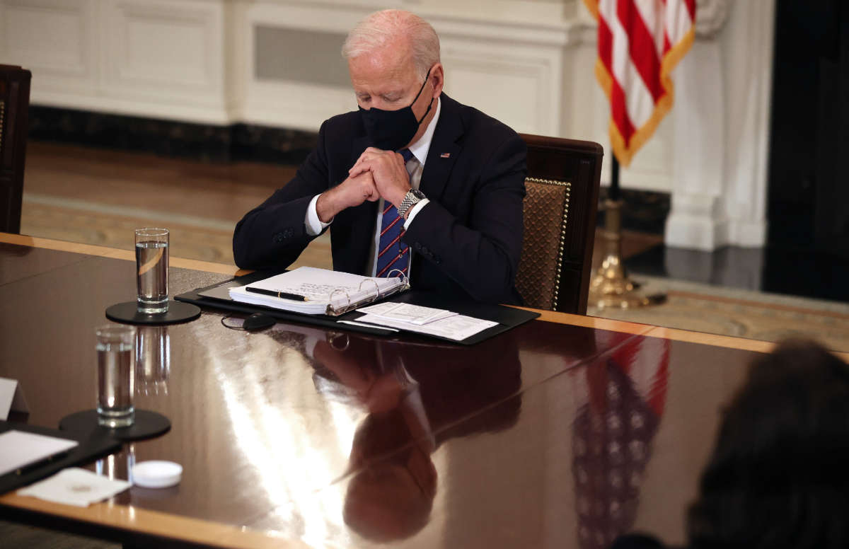 President Joe Biden delivers brief remarks to the press during a meeting with members of his cabinet and immigration advisors in the State Dining Room on March 24, 2021, in Washington, D.C.