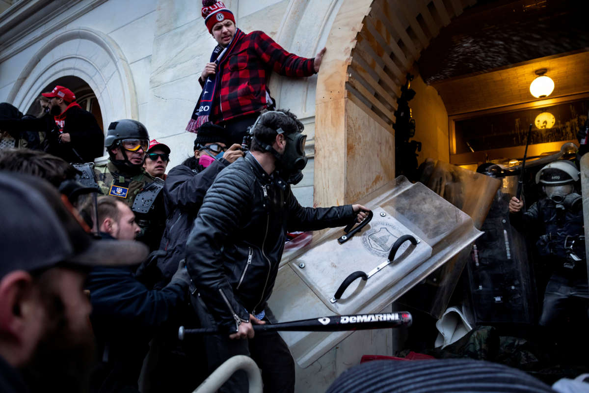 Trump supporters clash with police and security forces as people try to storm the U.S. Capitol on January 6, 2021, in Washington, D.C.