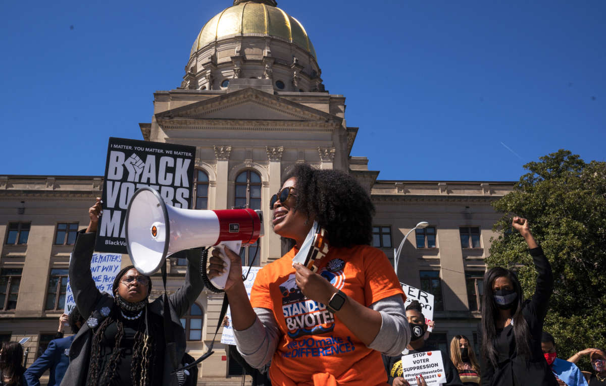 Demonstrators protest outside of the state capitol building in opposition of House Bill 531 on March 8, 2021, in Atlanta, Georgia.