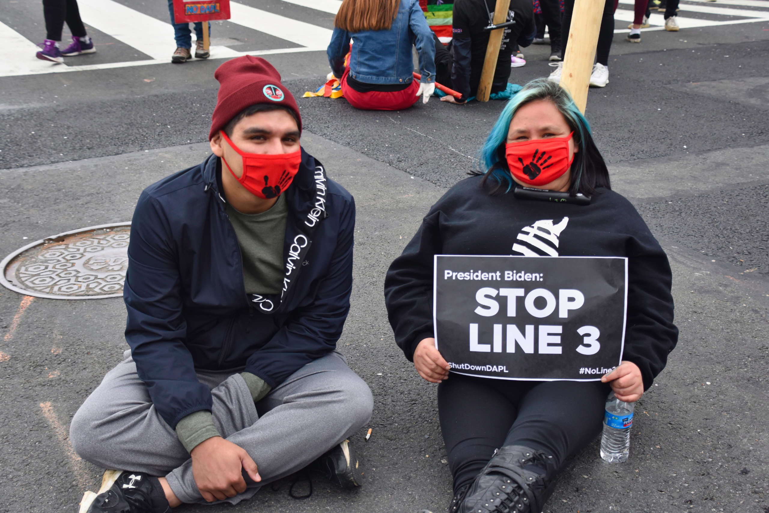 Waniye Lock locked down in the middle of Black Lives Matter Plaza in Washington, D.C., to show to Biden that she’ll do “whatever it takes” to stop the Dakota Access and Line 3 pipelines on April 1, 2021.