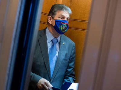 Sen. Joe Manchin is seen during a Senate vote in the Capitol on March 25, 2021.