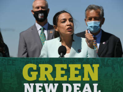 Rep. Alexandria Ocasio-Cortez speaks during a press conference to re-introduce the Green New Deal in front of the U.S. Capitol in Washington, D.C., on April 20, 2021.