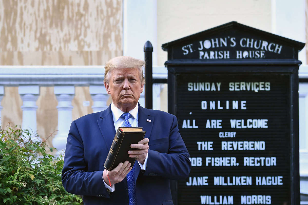 President Trump holds up a bible outside of St John's Episcopal church across Lafayette Park in Washington, D.C., on June 1, 2020.