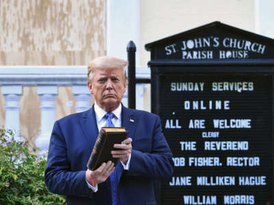 President Trump holds up a bible outside of St John's Episcopal church across Lafayette Park in Washington, D.C., on June 1, 2020.